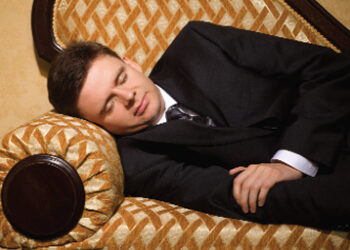 man_asleep_sofa_410