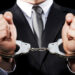 businessman handcuffs