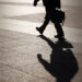 man-walking-with-shadow