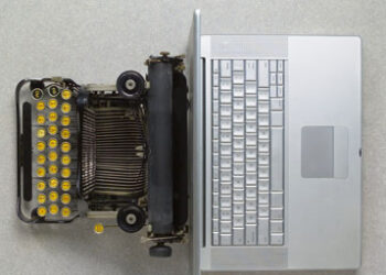 Typewriter and laptop