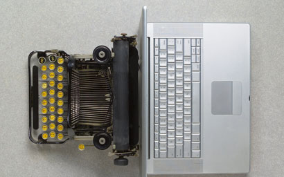 Typewriter and laptop